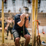 Participant covering his head as he cross Electroshock Therapy
