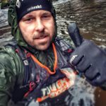 Participant taking a selfie in the river