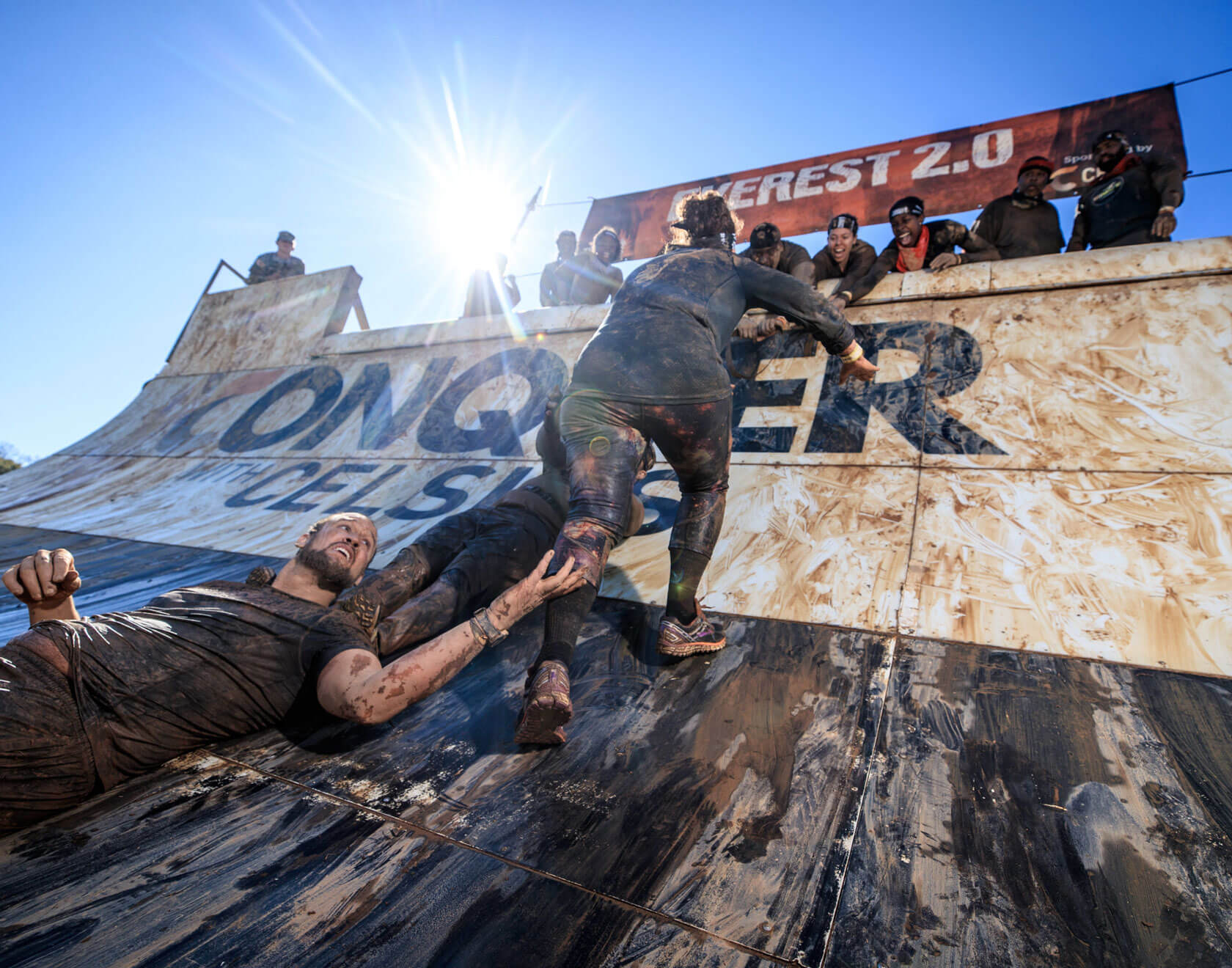 Participants showing their teamwork to overcome Everest