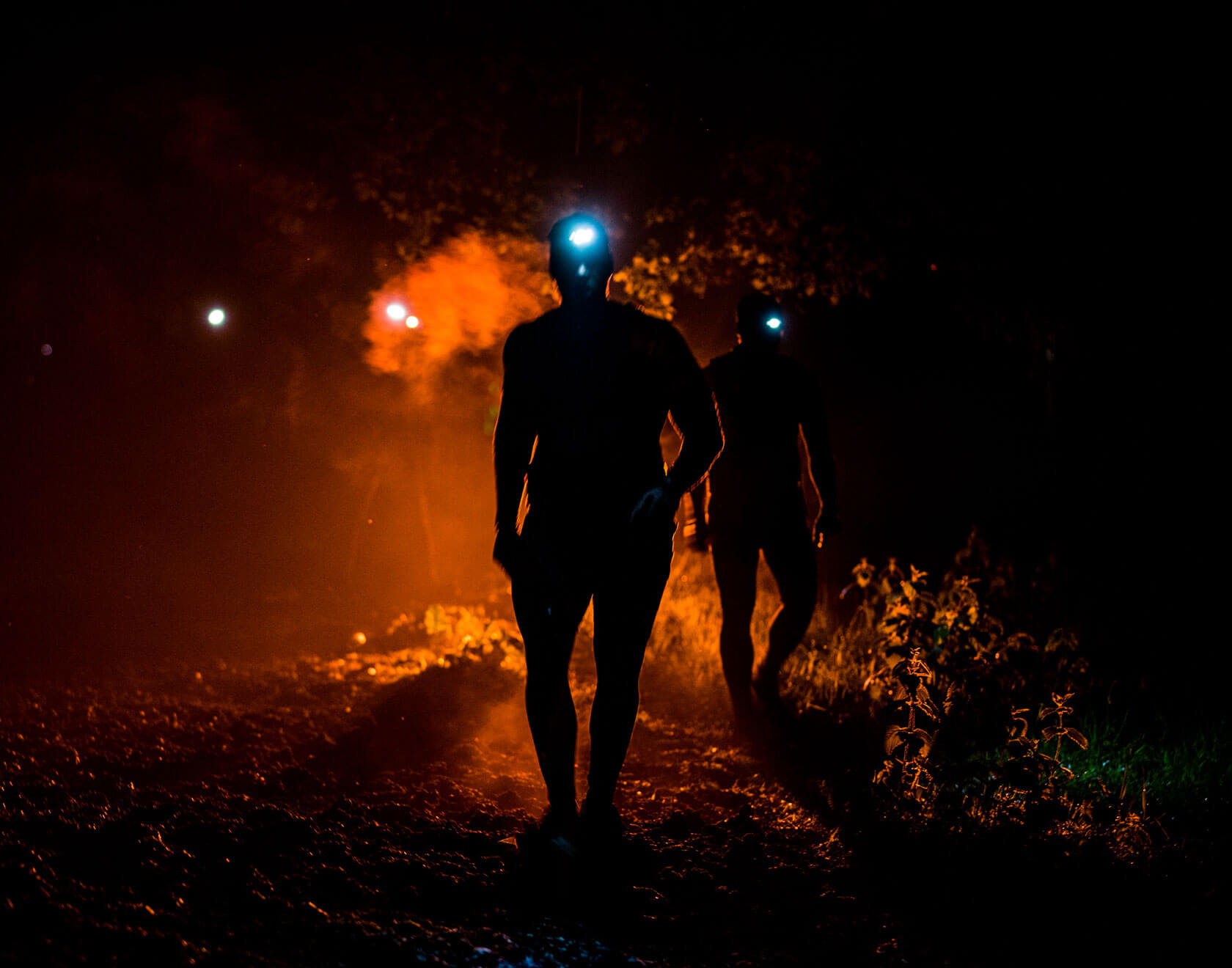 Participants walking in the dark with flashlight on in their heads