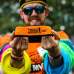 Volunteer showing off the Tough Mudder headband