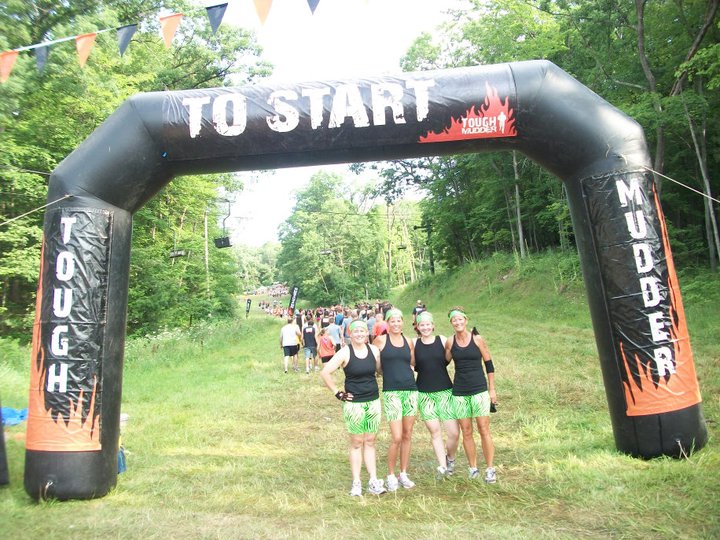 Participants posing for a picture in the starting line