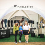 Participants taking a picture in the Fabletics Recovery Station
