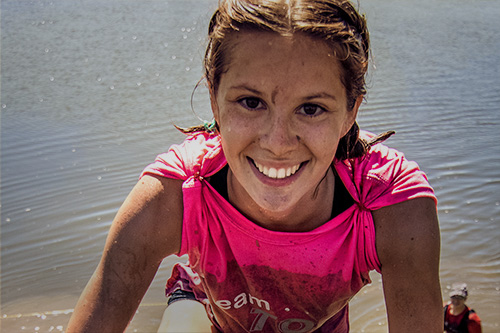 Participant in a pink top smiling at the camera