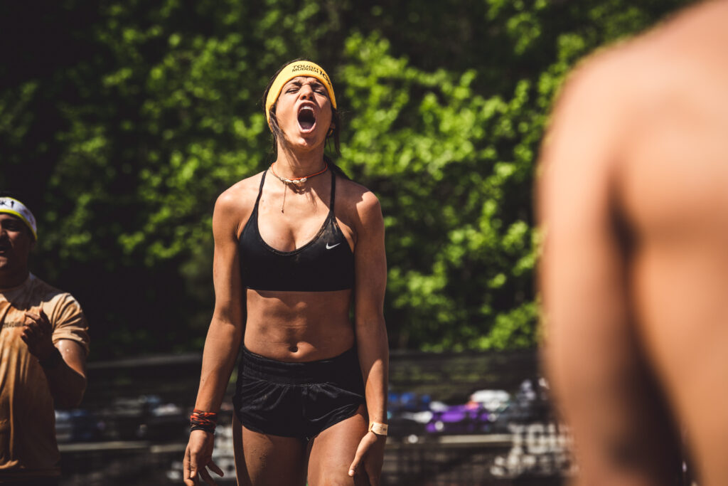 girl yelling on Tough Mudder course