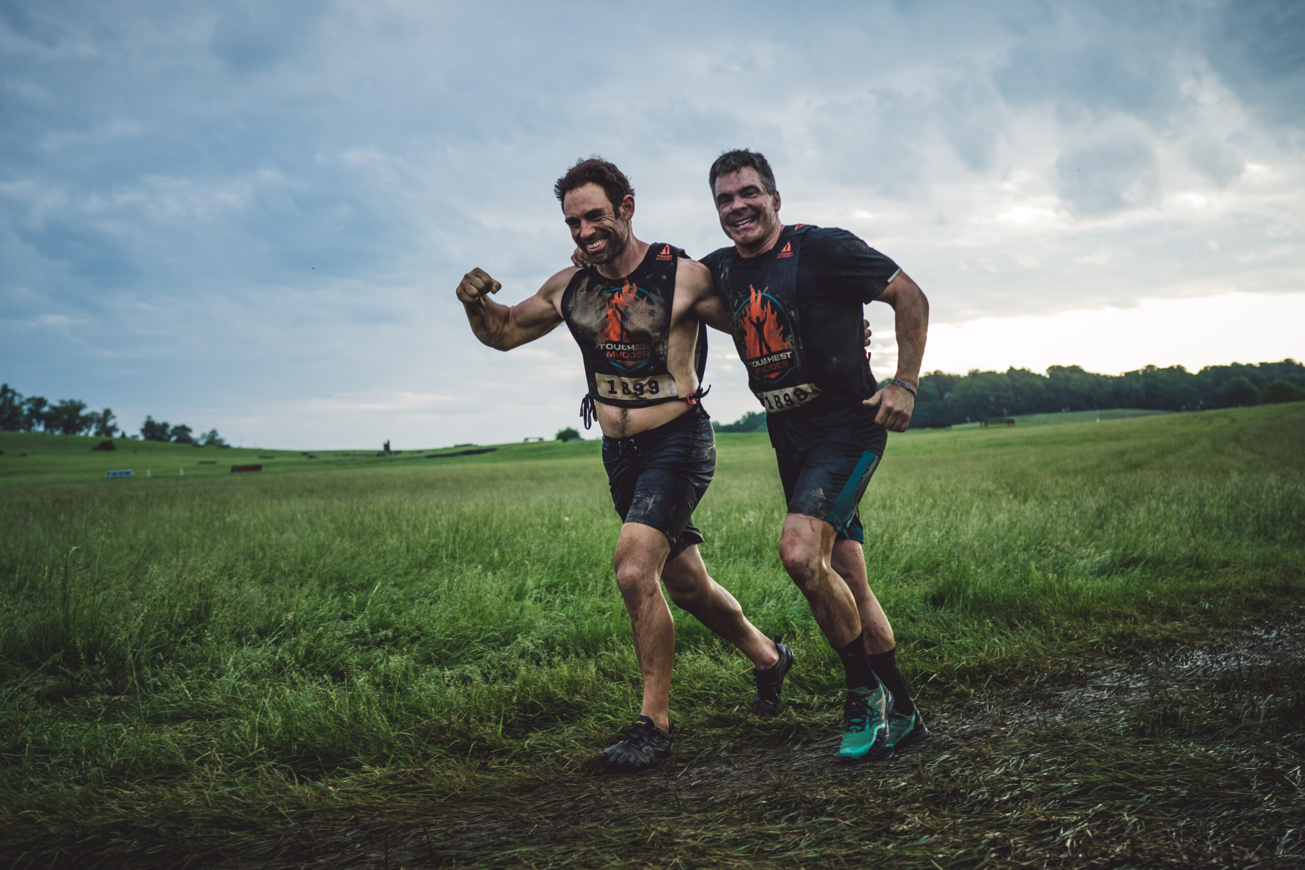 Participants running together in the field