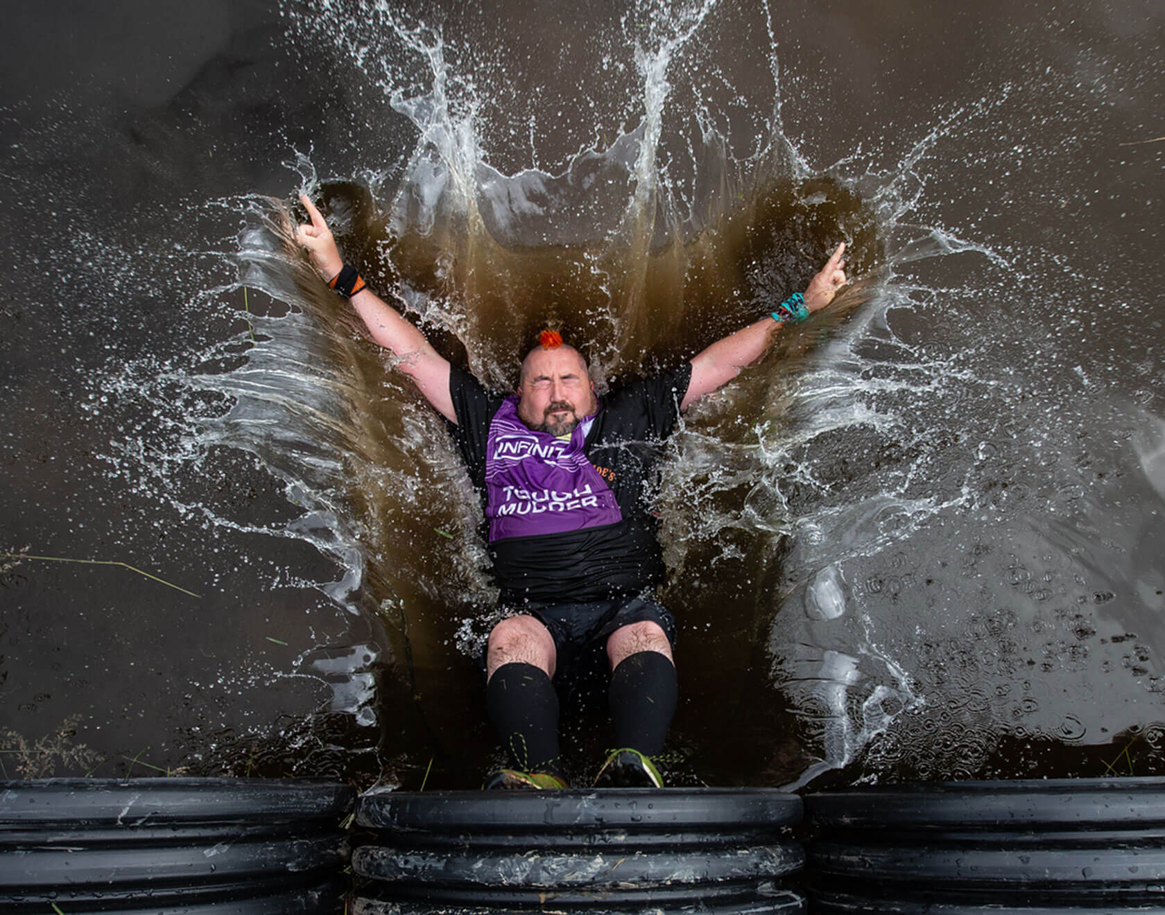 A participant fell into the water from a tube