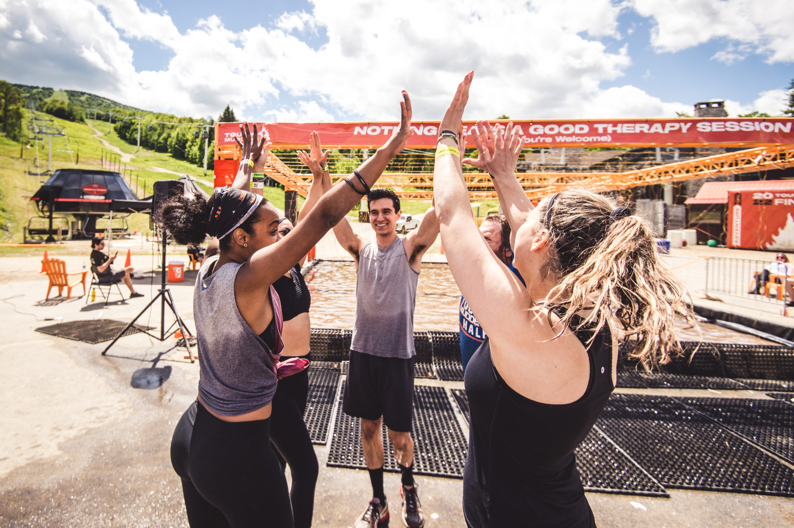 A team giving high-fives to each other