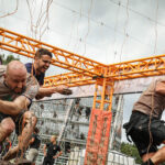 Tough Mudder participants running through Electroshock Therapy