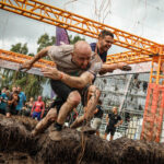 Tough Mudder participants running through Electroshock Therapy.