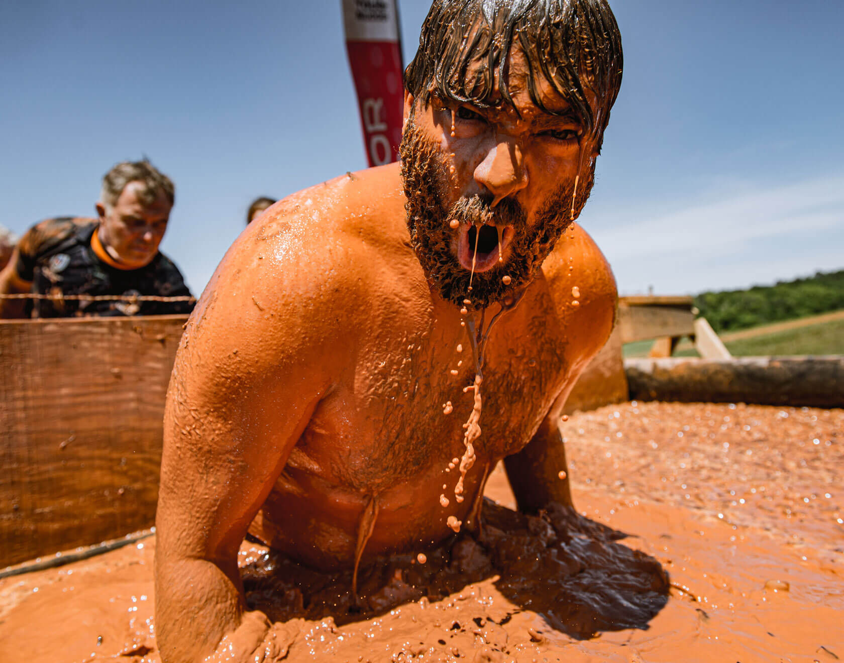 A man shouting as he dove into the icy water of Arctic Enema