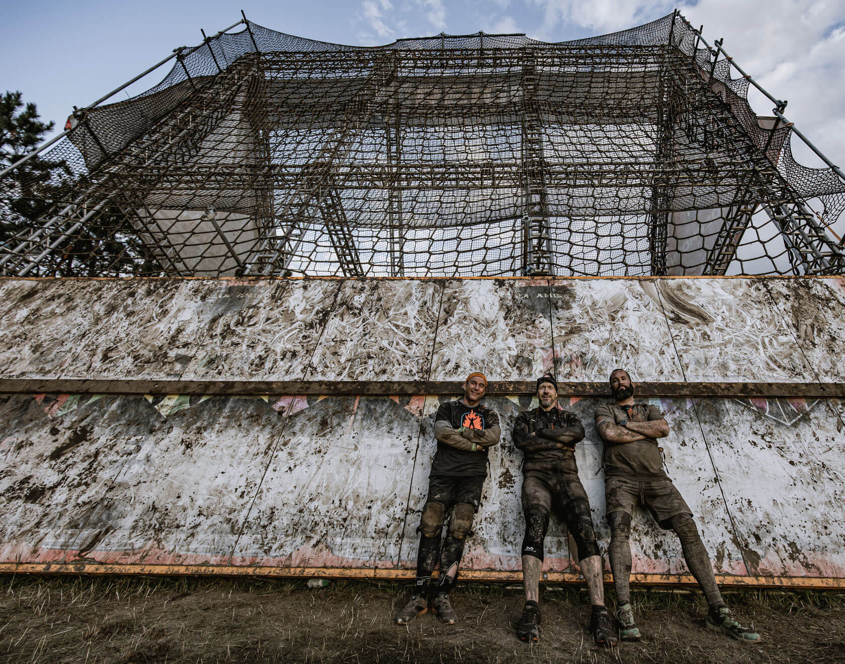 Three mudders posing in the front of Mudderhorn
