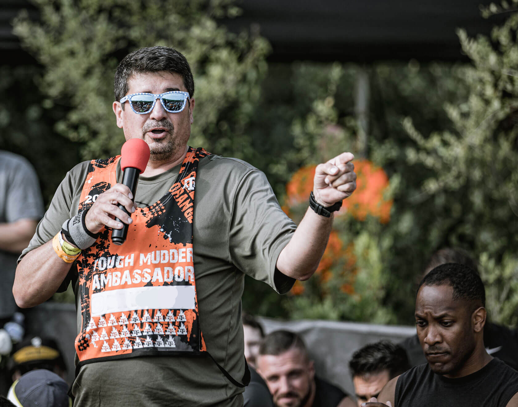 An ambassador talking in a mic