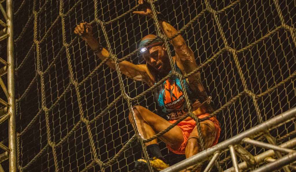 A participant climbing the Mudderhorn
