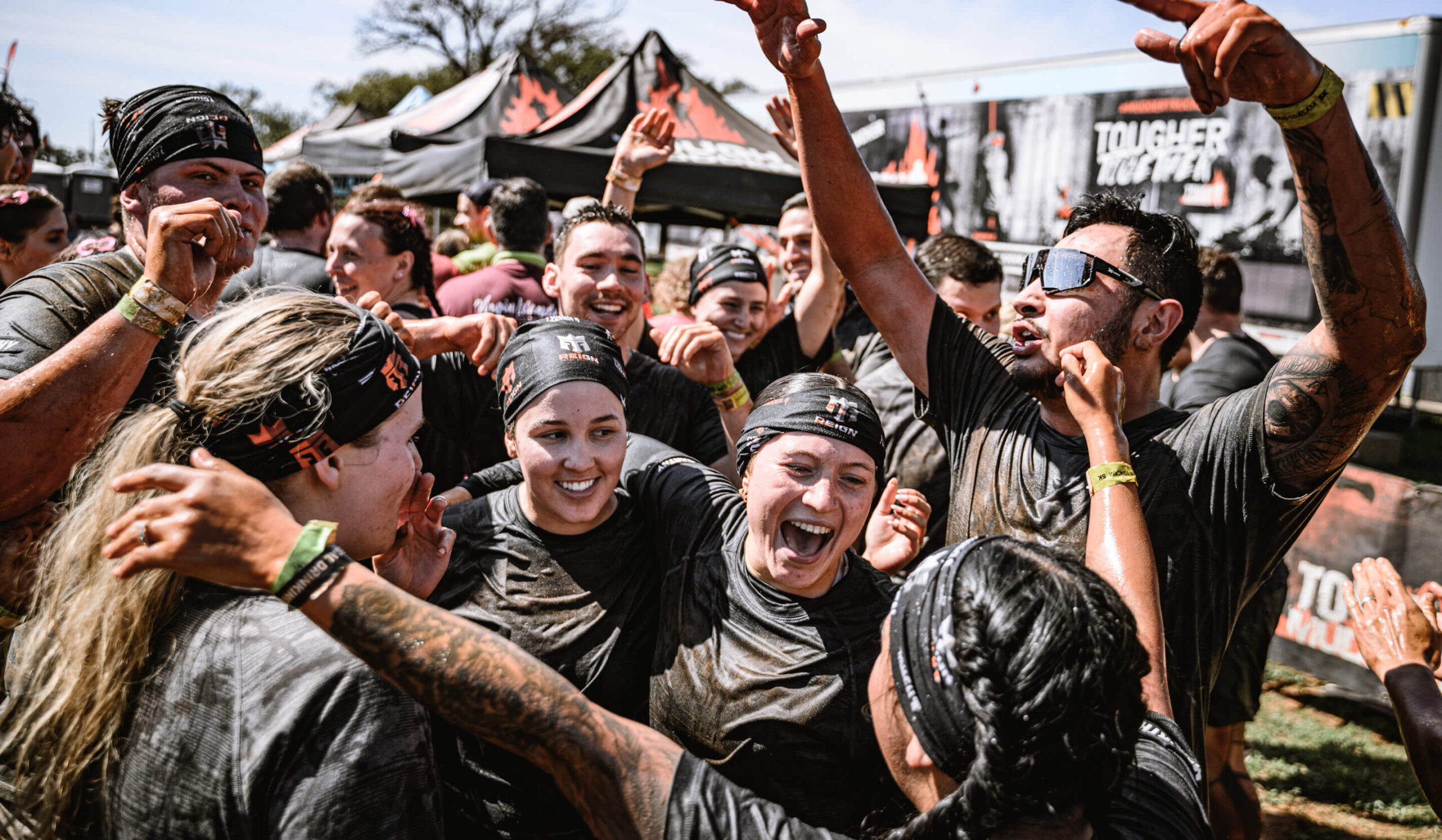 Participants cheering at the finish line